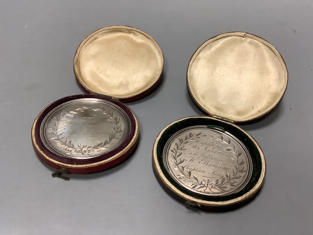Two cased William IV silver medallions within graved inscriptions, maker JE Terry and Co, London 1832 and 1833, diameter 52 mm.